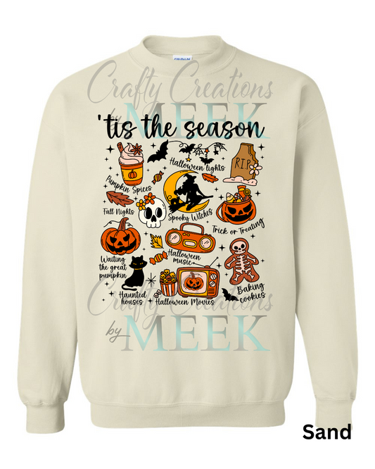 Beige sweatshirt with Halloween-themed graphics and text on a white background
